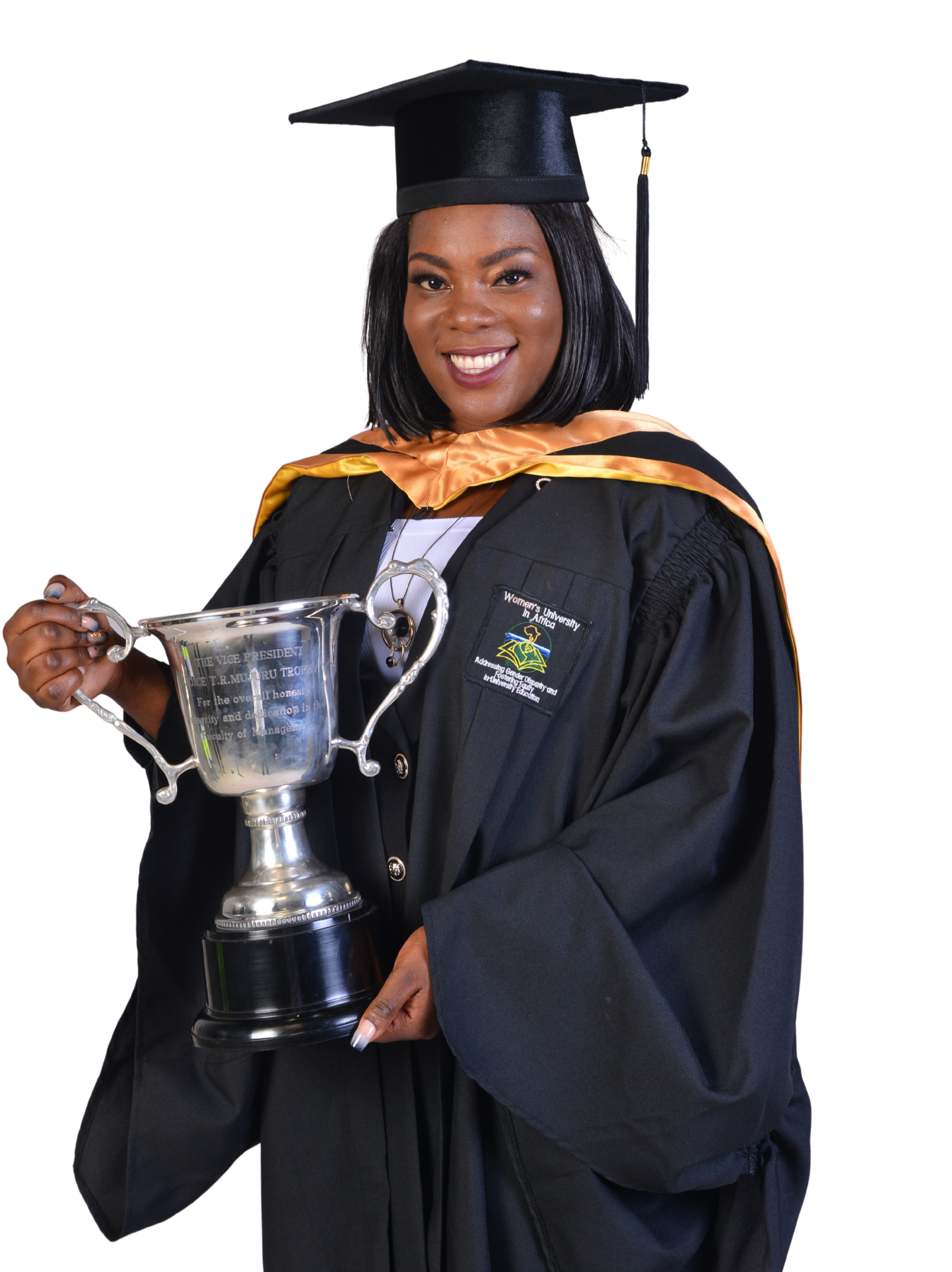 Women’s University in Africa graduate holding trophy